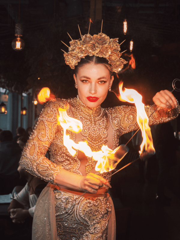 A woman performing with fire at Madera