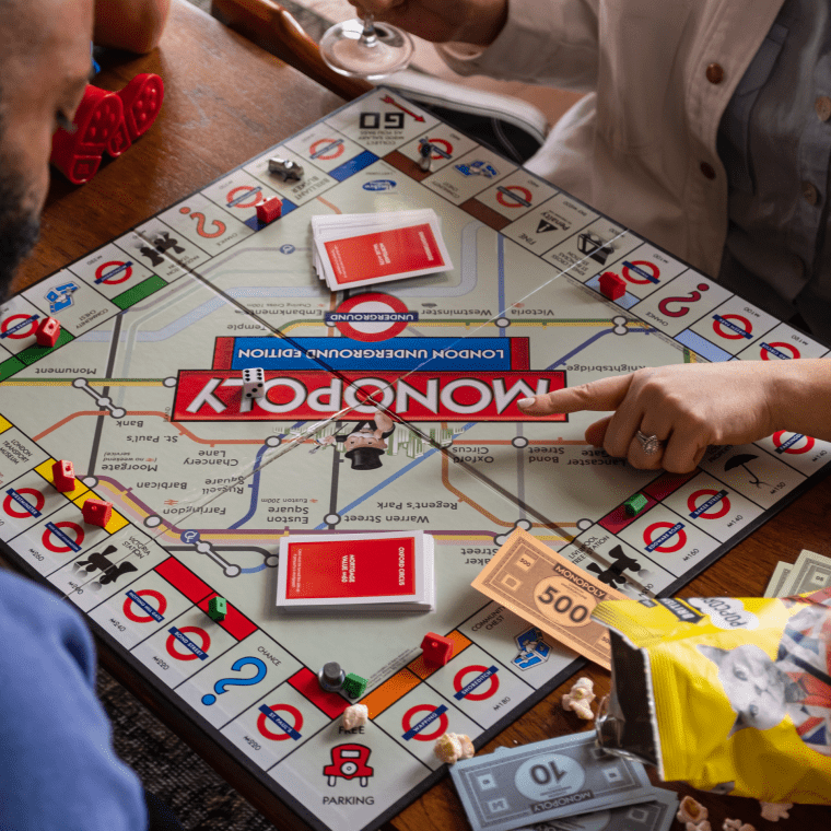 A family playing Monopoly