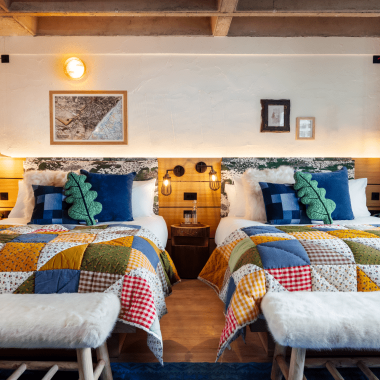 hotel room with two queen beds