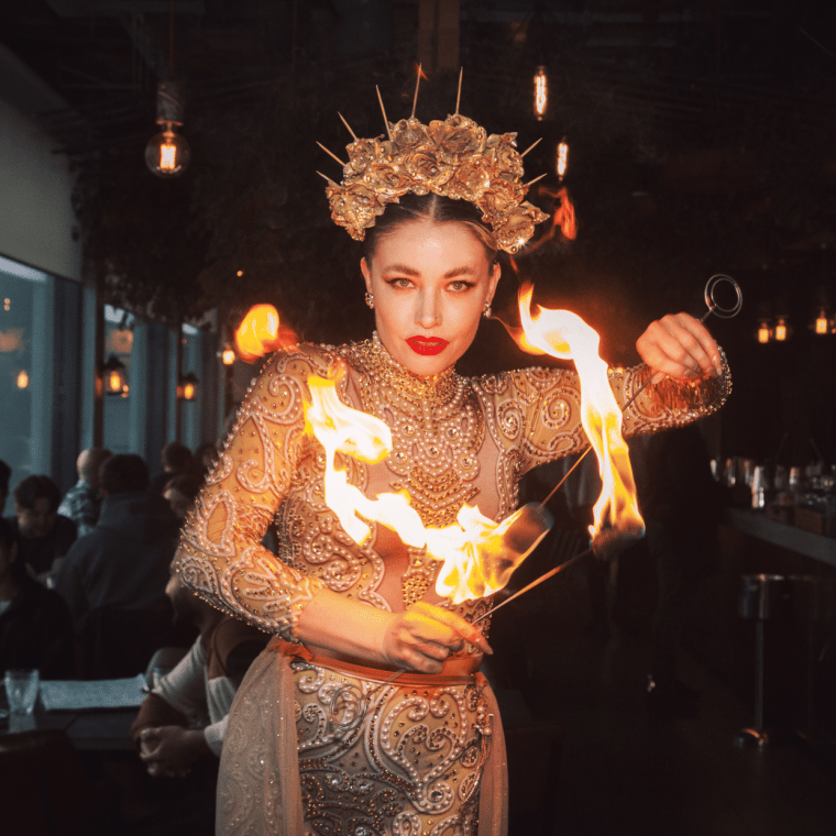 A woman performing with fire at Madera