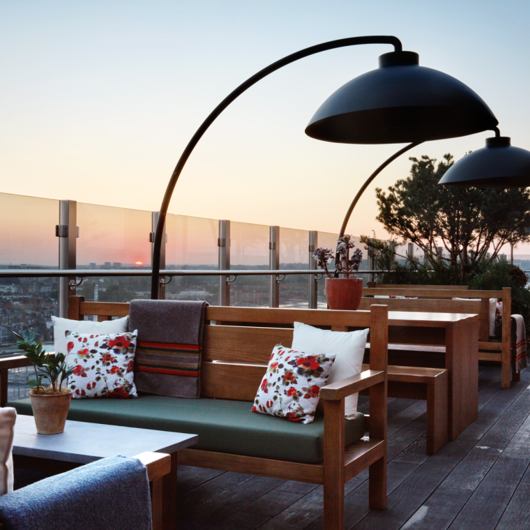 Outdoor dining area with hanging lights