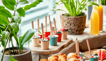 A spread of croissants, yogurt cups for a breakfast event at Treehouse.