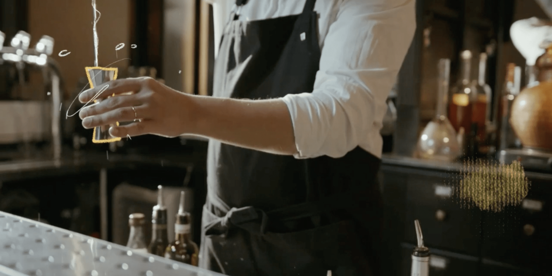 A man pouring a shot