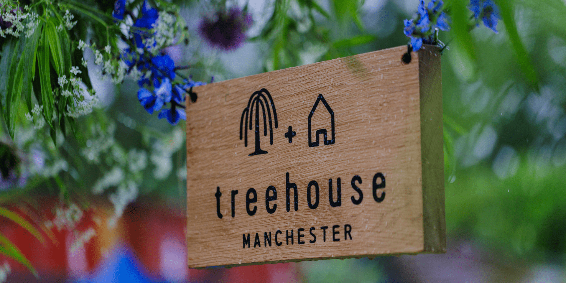 Treehouse Manchester sign in the garden