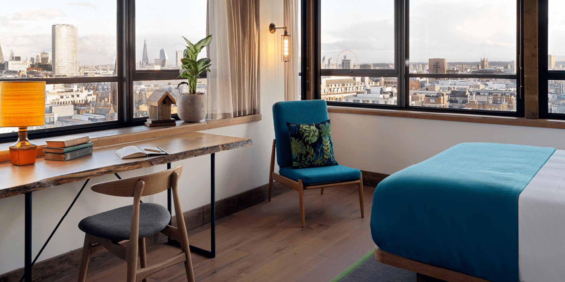hotel room with seating area and workspace