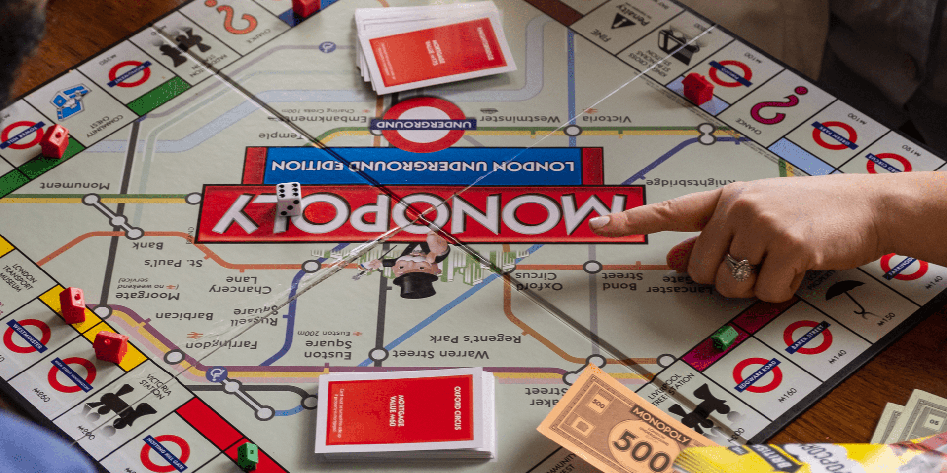 A family playing Monopoly