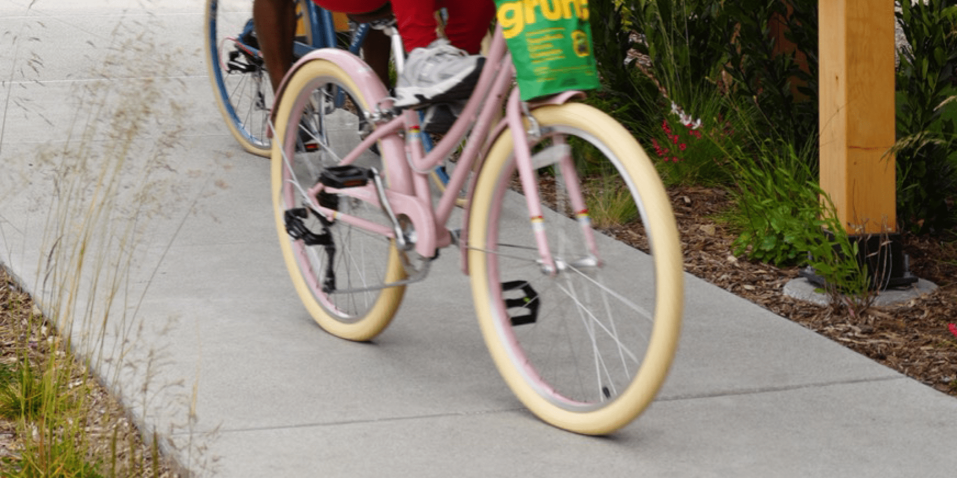 Kristen riding bike with Gruns