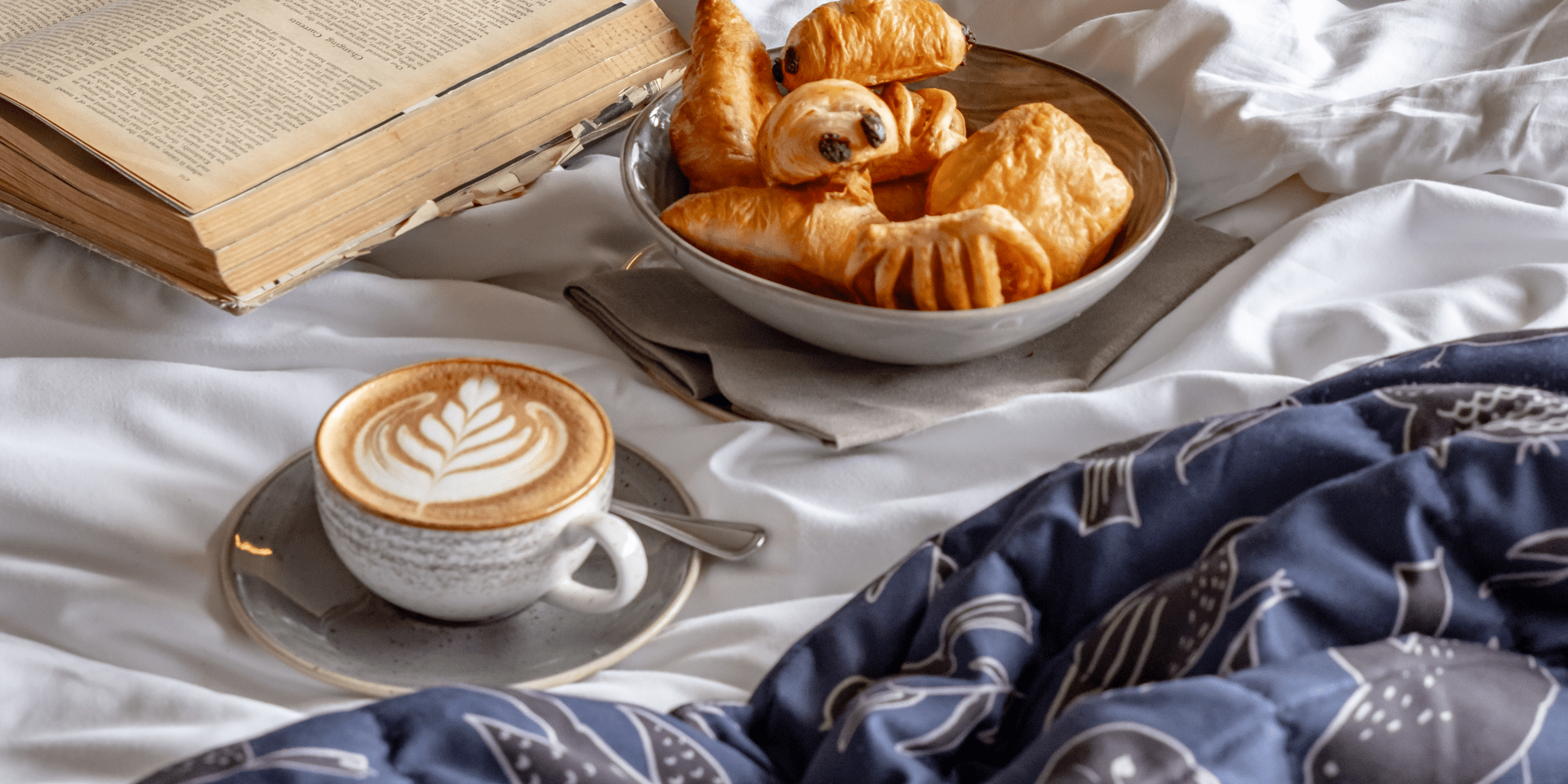 Breakfast in bed with a book