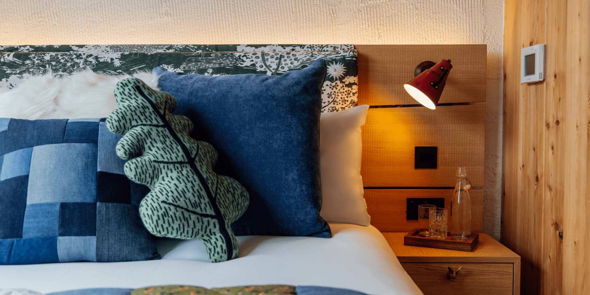 Super king bed with quilt and leaf pillow