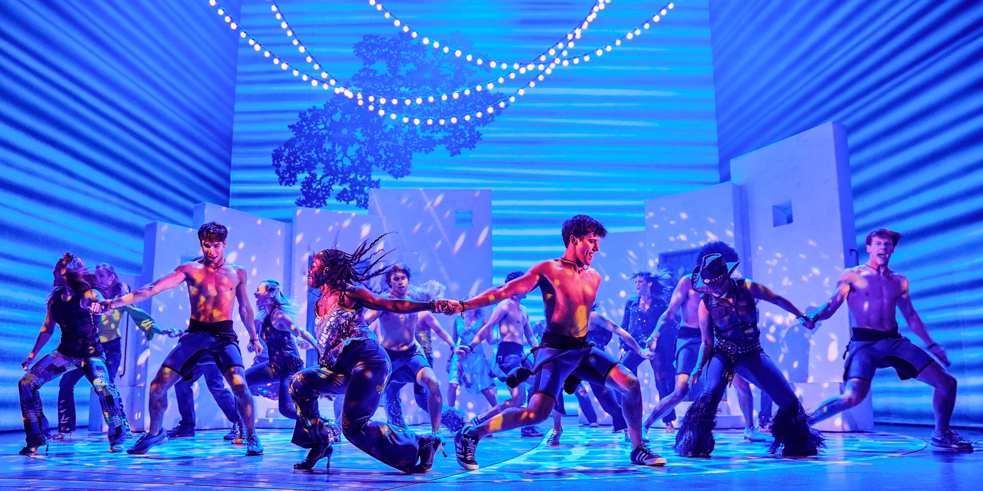 people on a stage dancing