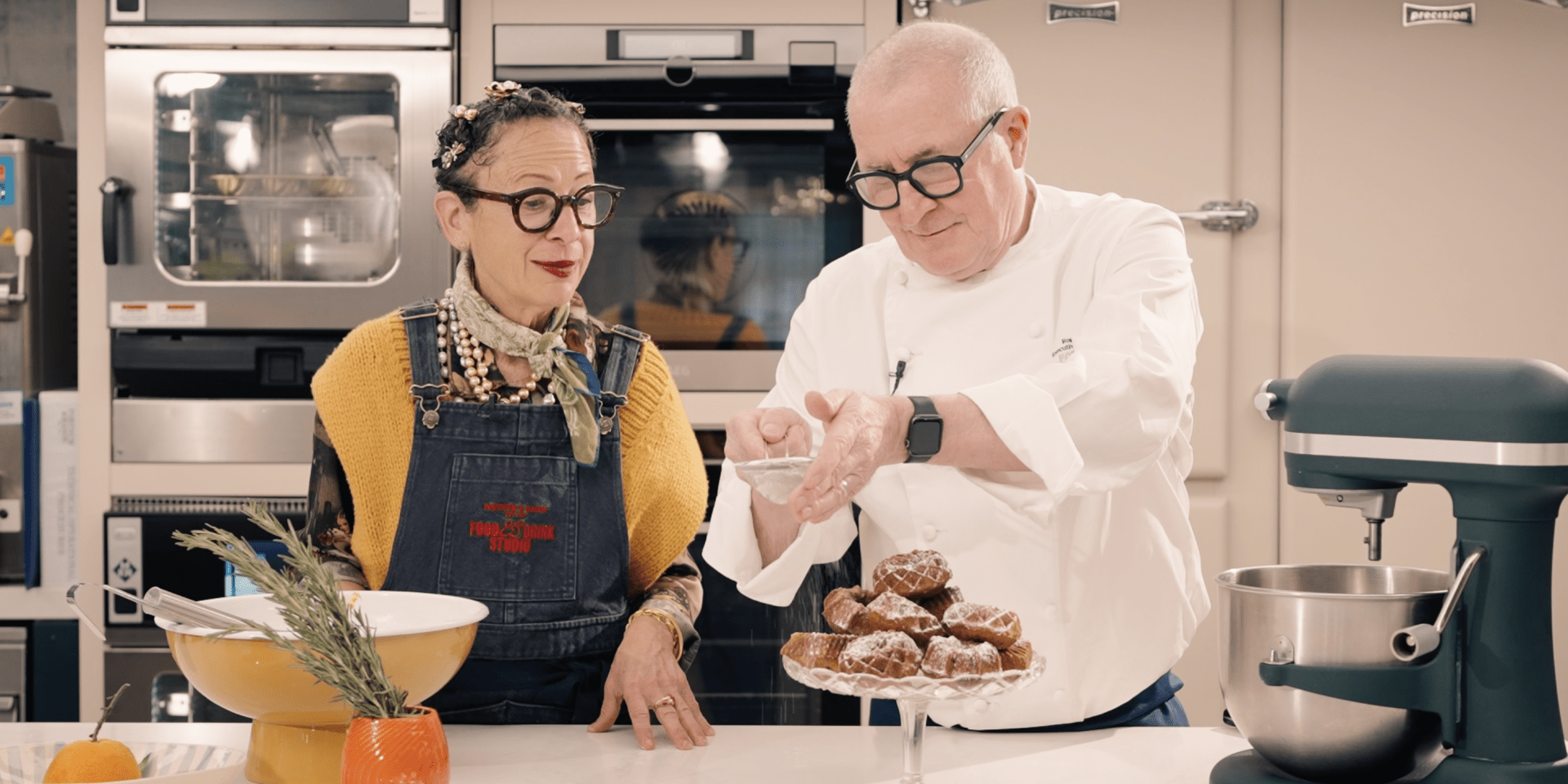 Nancy Silverton and a chef baking in a kitchen