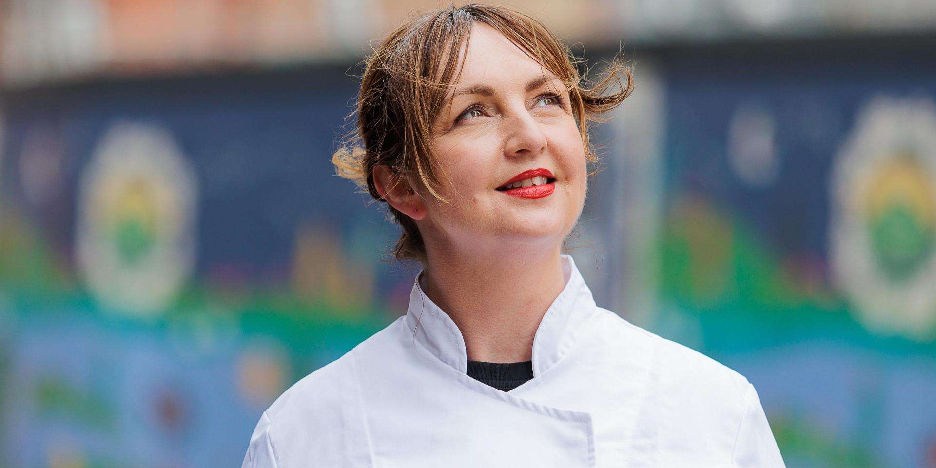 Chef Mary-Ellen McTague in her chef's coat staring at the sky