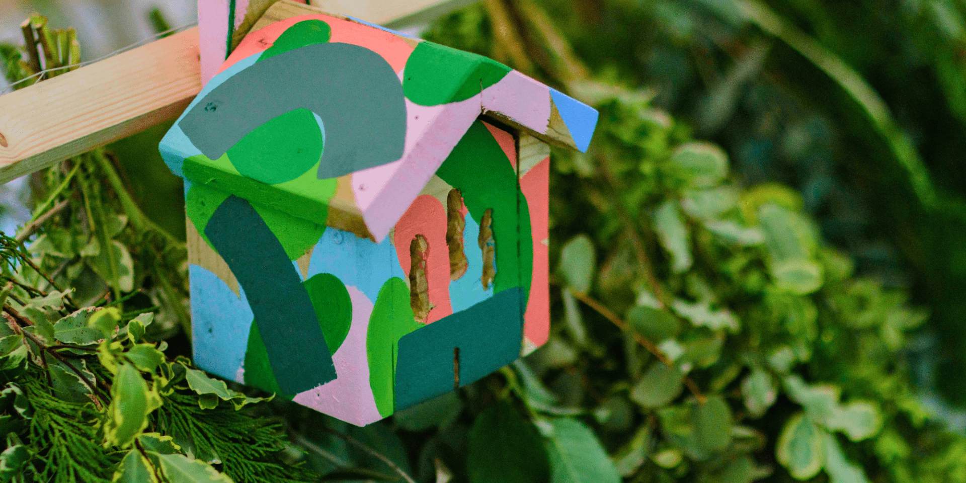 small colourful bird house