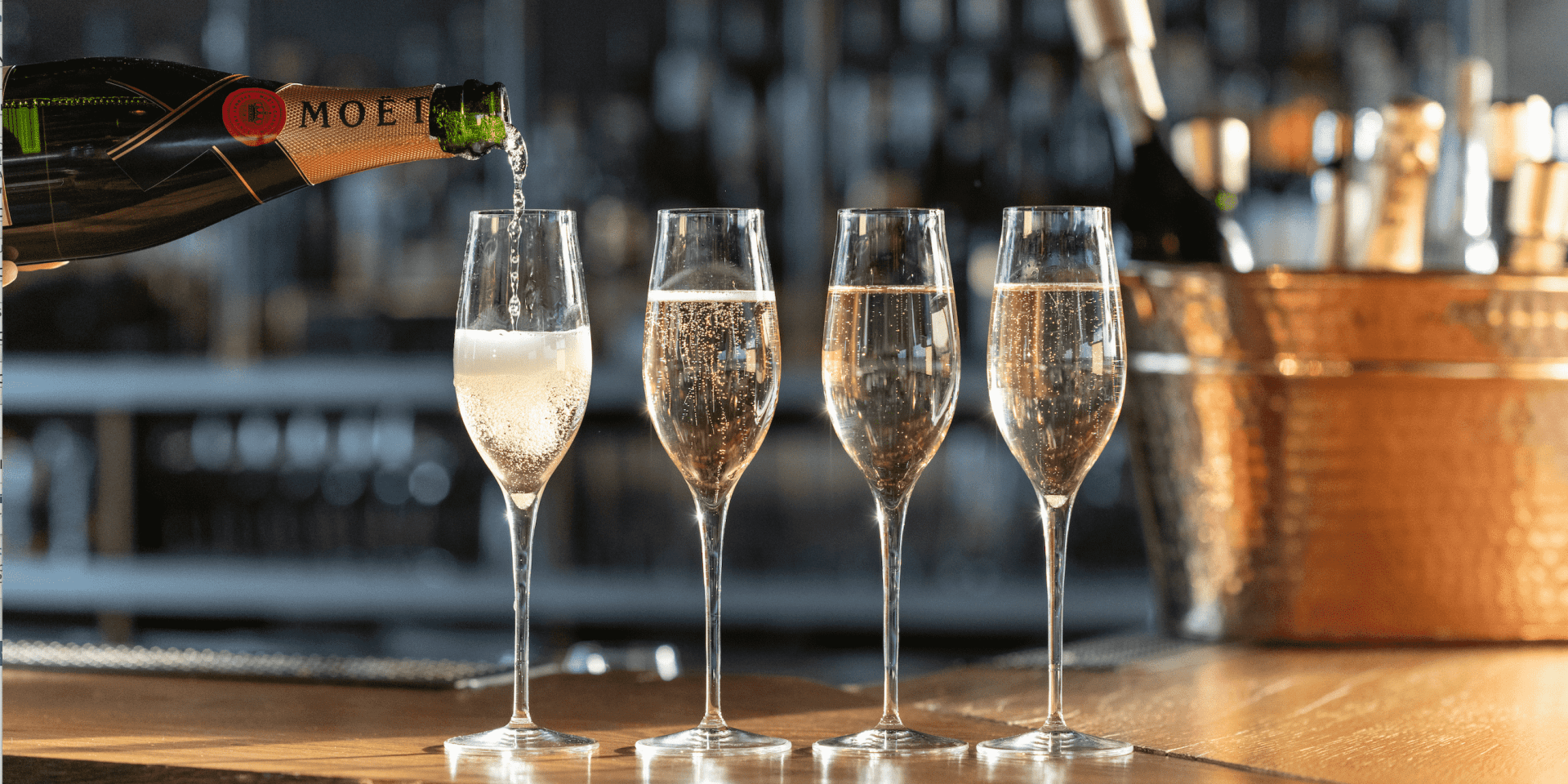 4 glasses of Moet Champagne