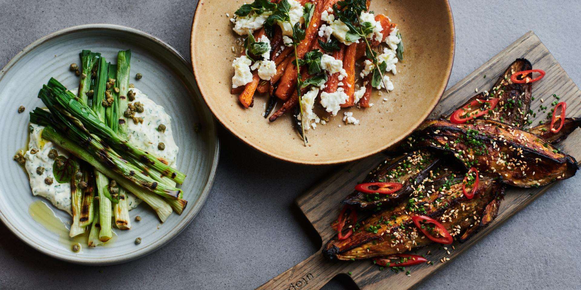 vegetable dishes on various plates